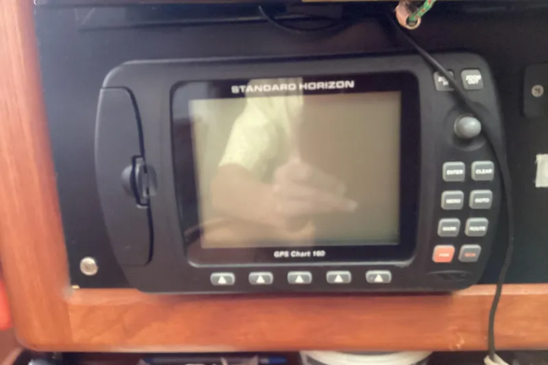 Slide: The Image of Standard Horizon GPS Chart 160 on 2001 Hunter 380 sailboat dashboard. - 24