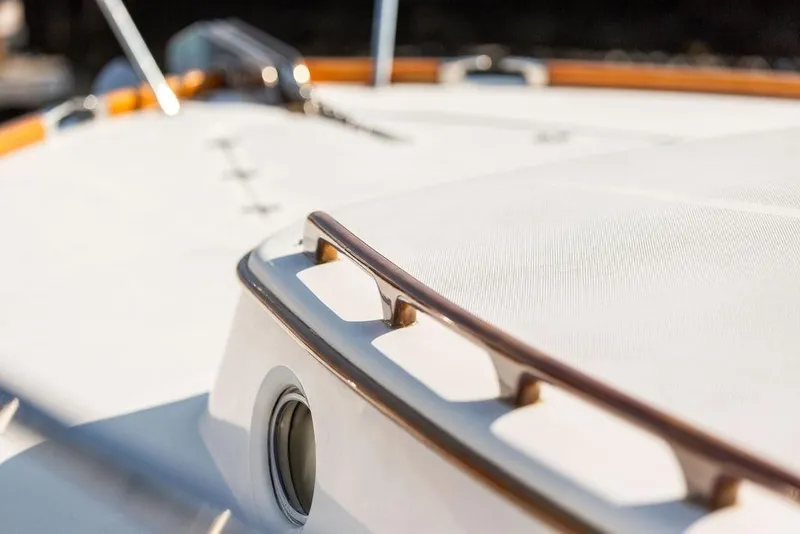 Slide: The Image of Close-up of 2002 Hinckley Talaria 44 yacht deck with sleek design details. - 12