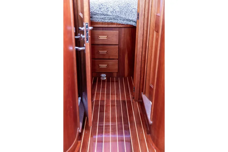 Slide: The Image of Interior of 2002 Hinckley Talaria 44 yacht with wooden flooring and cabinetry. - 31