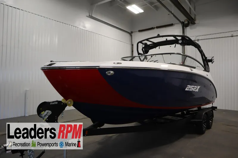 The Image of 2025 Yamaha Boats 252XE in showroom, featuring sleek design and modern features. - 0