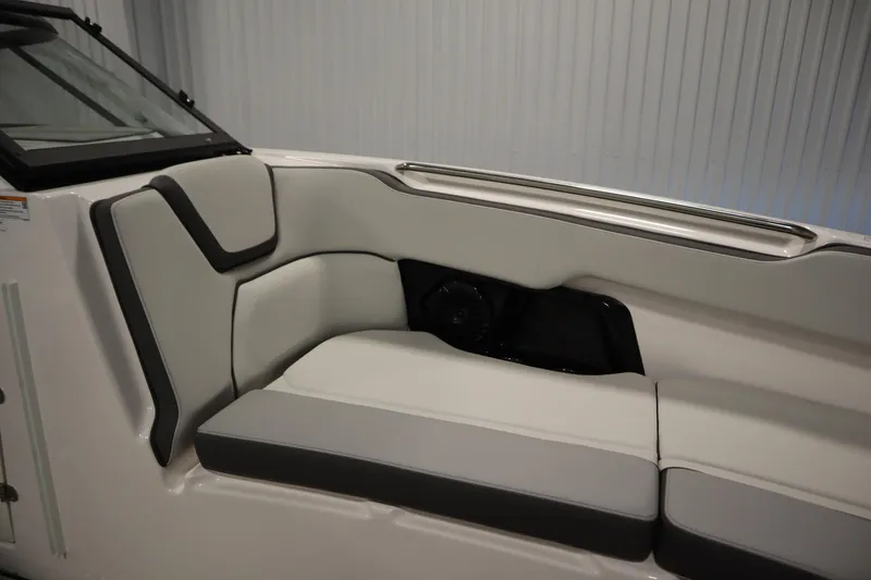 Slide: The Image of 2025 Yamaha Boats 252XE interior seating with sleek design and comfortable upholstery. - 13