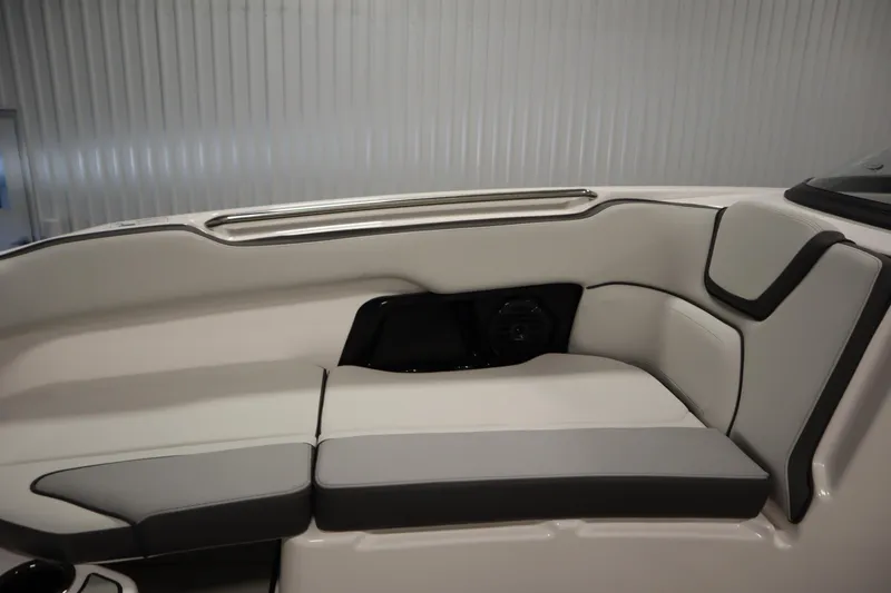 Slide: The Image of 2025 Yamaha Boats 252XE interior seating with sleek, modern design and comfortable upholstery. - 14
