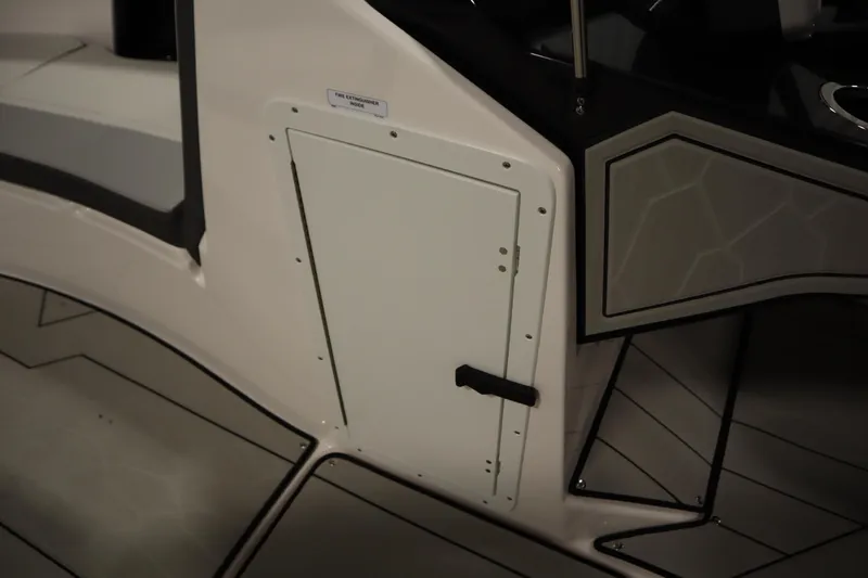 Slide: The Image of Interior view of 2025 Yamaha Boats 252XE, featuring sleek design and storage compartment. - 15