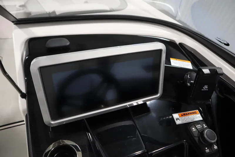 Slide: The Image of 2025 Yamaha Boats 252XE dashboard with touchscreen display and control panel. - 20
