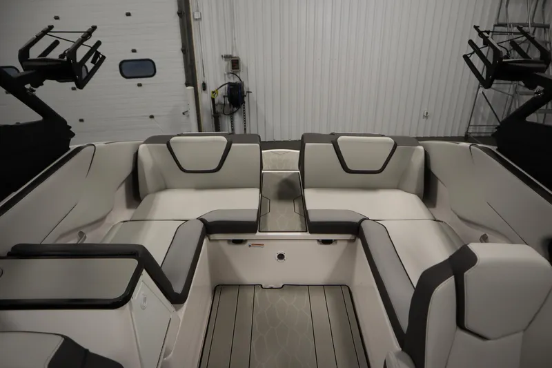 Slide: The Image of 2025 Yamaha Boats 252XE interior with sleek seating and modern design. - 30