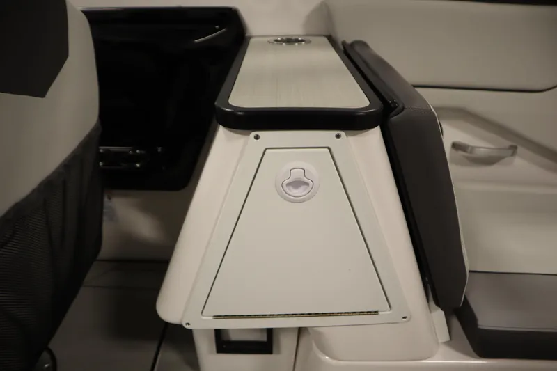 Slide: The Image of 2025 Yamaha Boats 252XE interior detail, featuring sleek seating and modern design elements. - 34