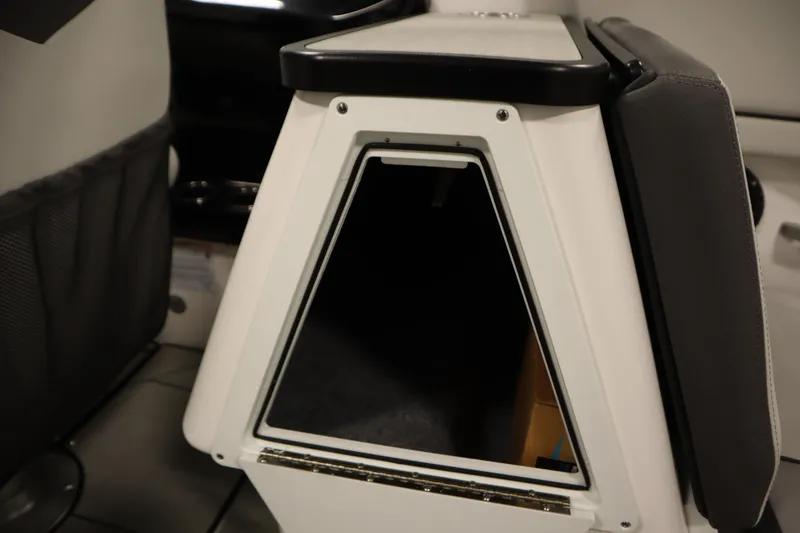 Slide: The Image of Interior storage compartment of 2025 Yamaha Boats 252XE, showcasing sleek design and functionality. - 35