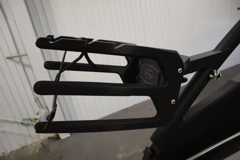 Slide: The Image of Yamaha Boats 2025 252XE wakeboard rack in a storage facility. - 38