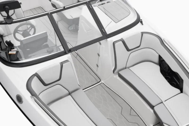 Slide: The Image of 2025 Yamaha Boats 252XE interior with sleek seating and modern dashboard design. - 53