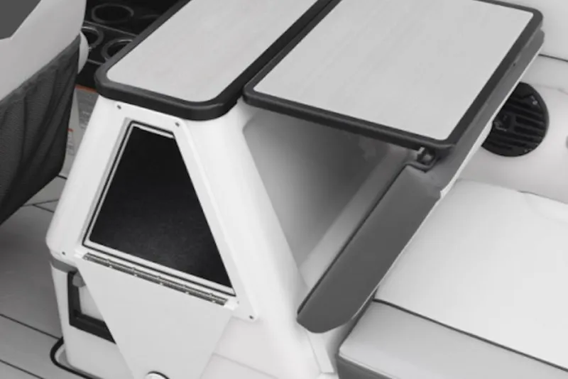 Slide: The Image of 2025 Yamaha Boats 252XE interior with sleek storage compartment and modern design. - 55