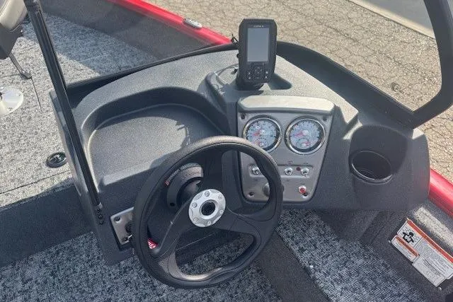 Slide: The Image of Steering console of 2026 Tracker Pro Guide V-16 WT boat with gauges and fishfinder. - 10