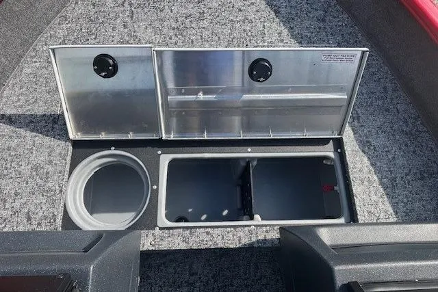 Slide: The Image of 2026 Tracker Pro Guide V-16 WT boat storage compartments with open lids, showcasing interior space. - 8