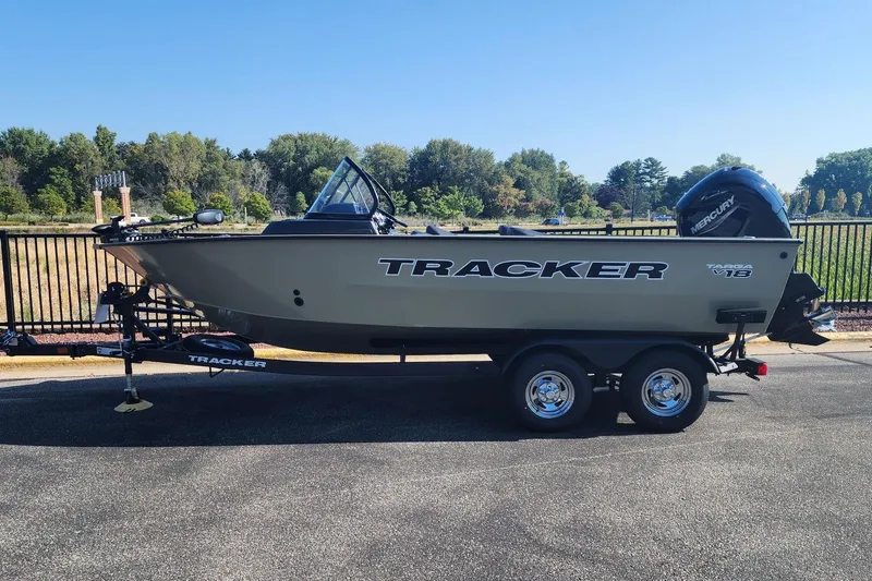 The Image of 2026 Tracker Targa V-18 WT boat on trailer, parked outdoors. - 0