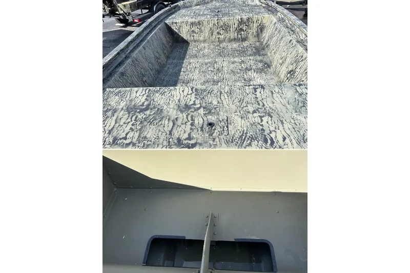 Slide: The Image of 2026 Tracker Grizzly 1648 Utility boat interior with camouflage pattern. - 2