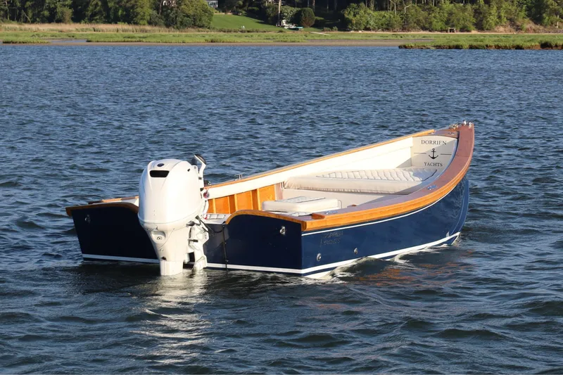 The Image of 2025 DORRIEN YACHTS 160T 1/1 boat on calm water at sunset. - 0