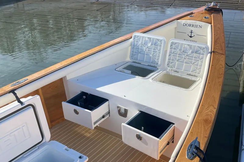Slide: The Image of Luxury DORRIEN YACHTS 160T 1/1, 2025 model, featuring elegant wood and storage compartments. - 19