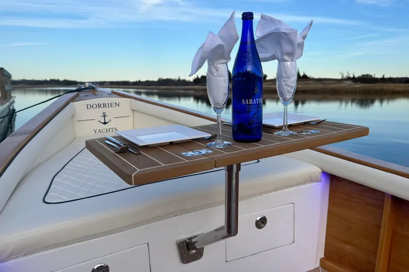 Slide: The Image of Luxurious 2025 Dorrien Yachts 160T with elegant dining setup on deck. - 9