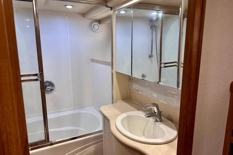 Slide: The Image of Bathroom interior of 2000 Pacific Mariner 65 Motoryacht with shower and sink. - 22