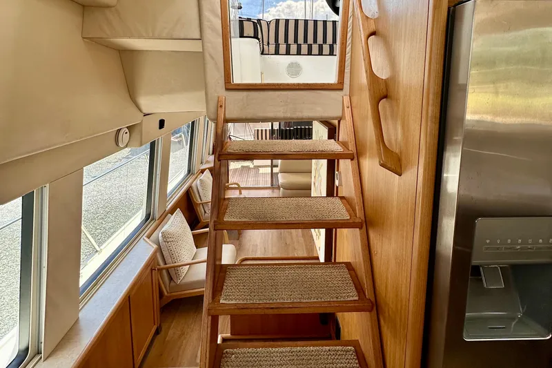 Slide: The Image of Interior of 2000 Pacific Mariner 65 Motoryacht with wooden stairs and modern kitchen. - 32