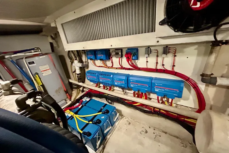 Slide: The Image of Engine room of 2000 Pacific Mariner 65 Motoryacht with electrical systems and wiring. - 84