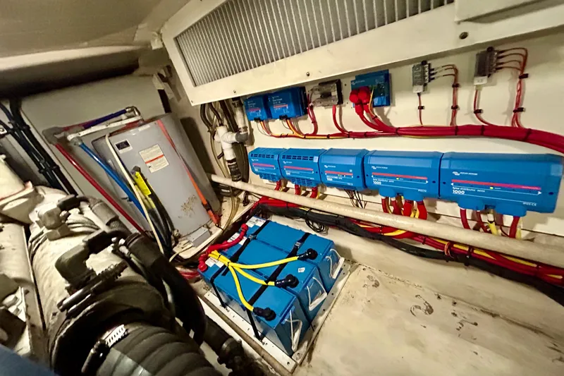 Slide: The Image of Engine room of 2000 Pacific Mariner 65 Motoryacht with electrical systems and wiring. - 85