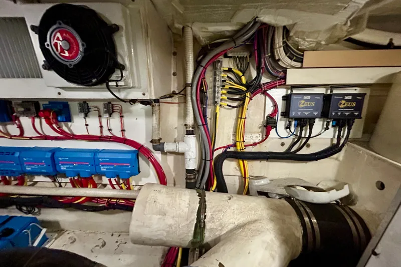 Slide: The Image of Engine room wiring and components of a 2000 Pacific Mariner 65 Motoryacht. - 87