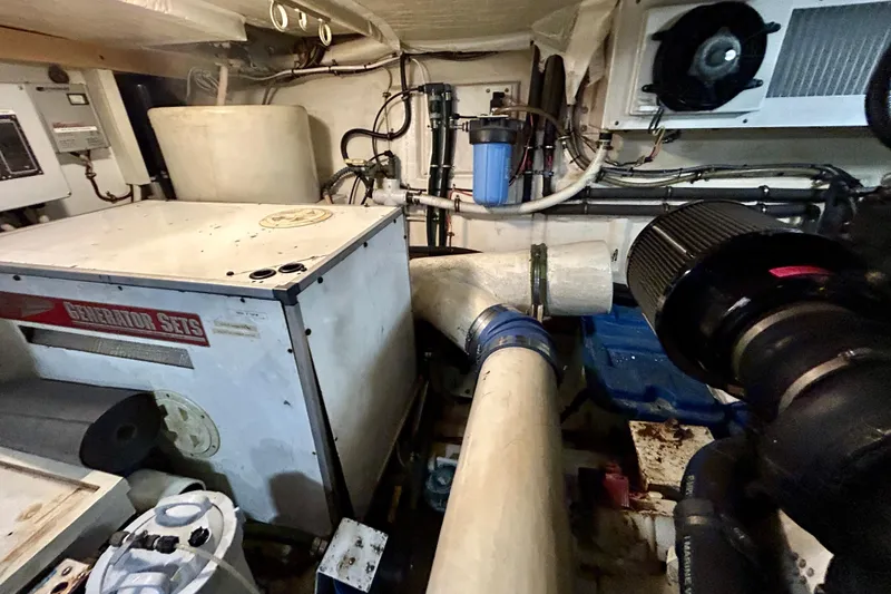 Slide: The Image of Engine room of 2000 Pacific Mariner 65 Motoryacht with generator and piping system. - 92