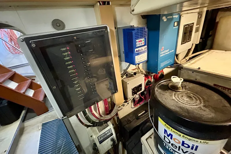 Slide: The Image of Engine room of 2000 Pacific Mariner 65 Motoryacht with control panel and equipment. - 93