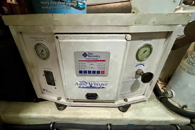 Slide: The Image of Sea Recovery Aqua Whisper system on 2000 Pacific Mariner 65 Motoryacht, featuring pressure gauges. - 98
