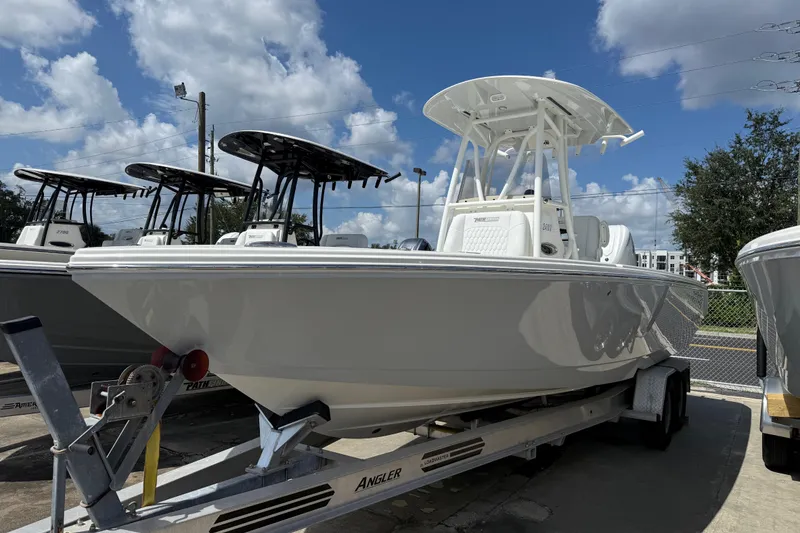 Slide: The Image of 2026 Pathfinder F350XSA2 boat on trailer under blue sky. - 3