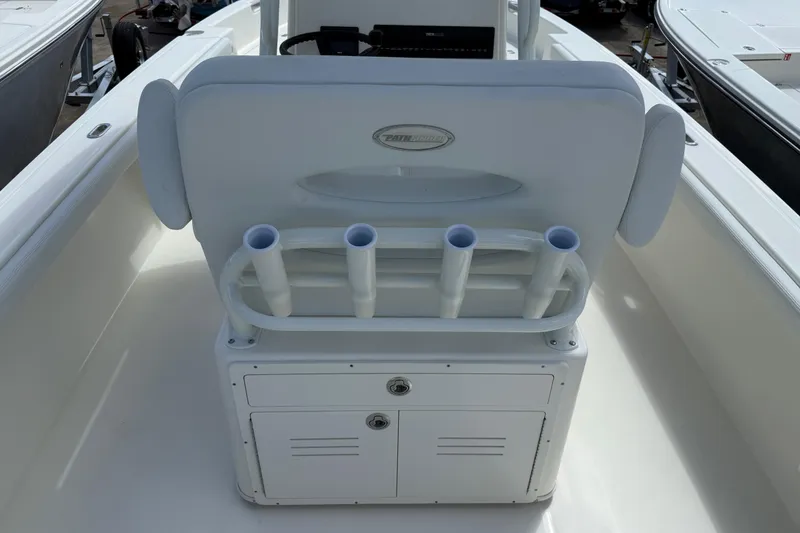 Slide: The Image of 2026 Pathfinder F350XSA2 boat interior with rod holders and storage compartment. - 6