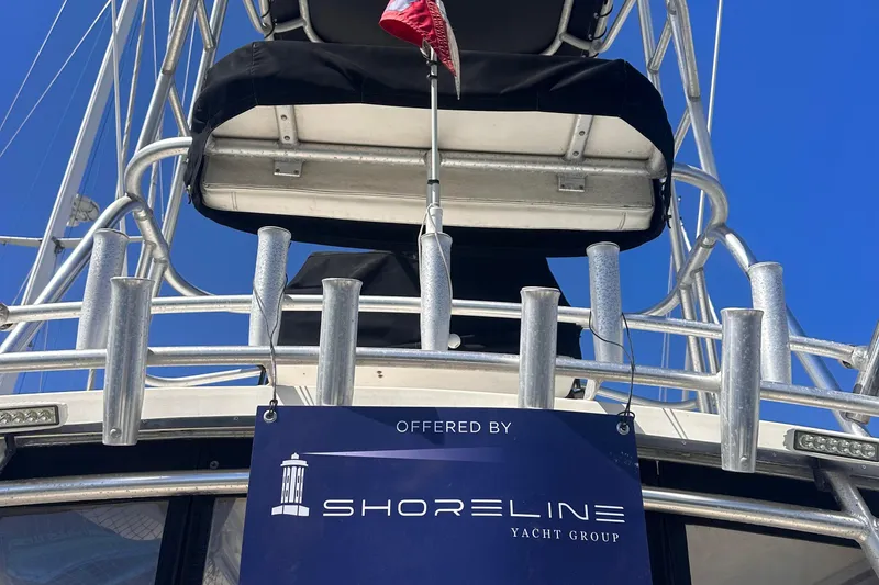 Slide: The Image of 2004 Carolina Classic Express Cabin Cruiser offered by Shoreline Yacht Group. - 13