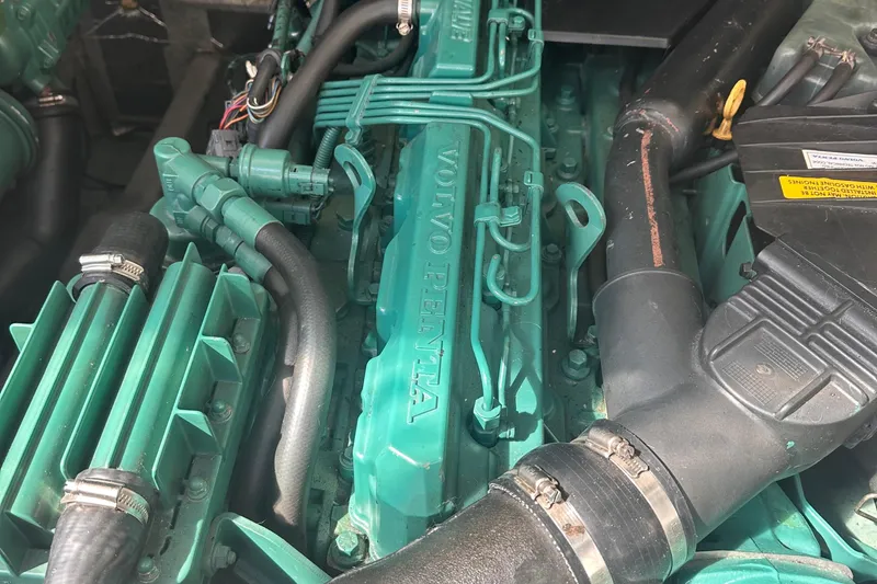 Slide: The Image of Engine of a 2004 Carolina Classic Express Cabin Cruiser with Volvo Penta components. - 22