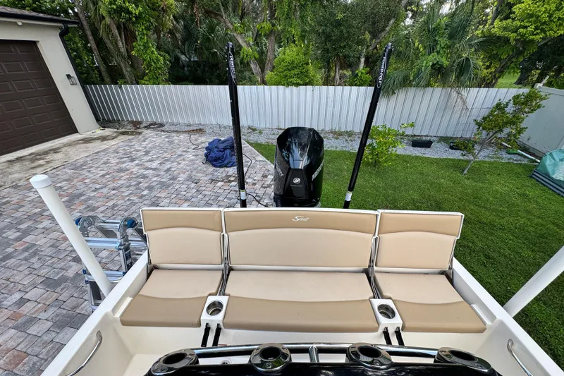 Slide: The Image of 2020 Scout 251 XSS boat on calm water, aerial view. - 11