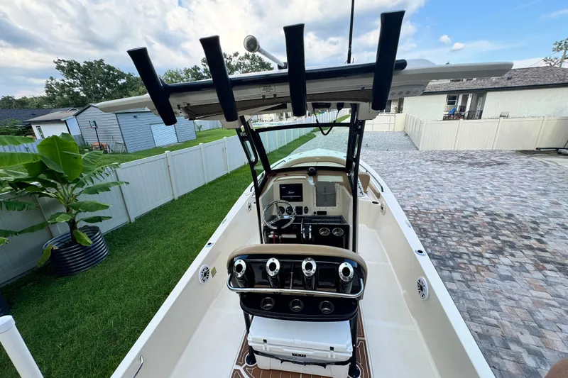 Slide: The Image of Aerial view of 2020 Scout 251 XSS boat on calm water. - 14