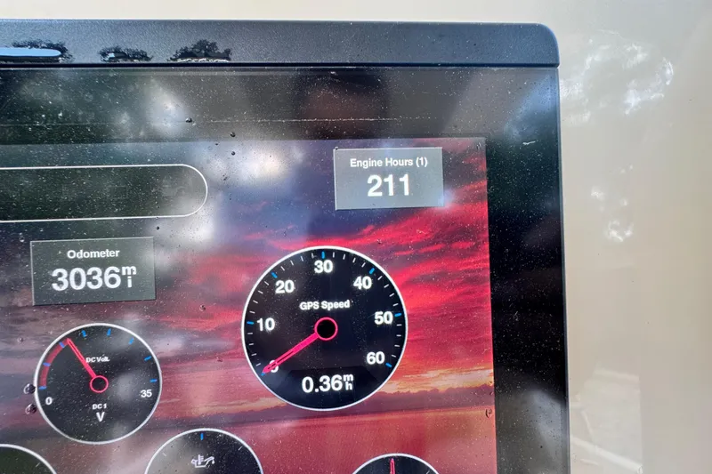 Slide: The Image of Display panel of 2020 Scout 251 XSS showing 211 engine hours and 3036 miles. - 42