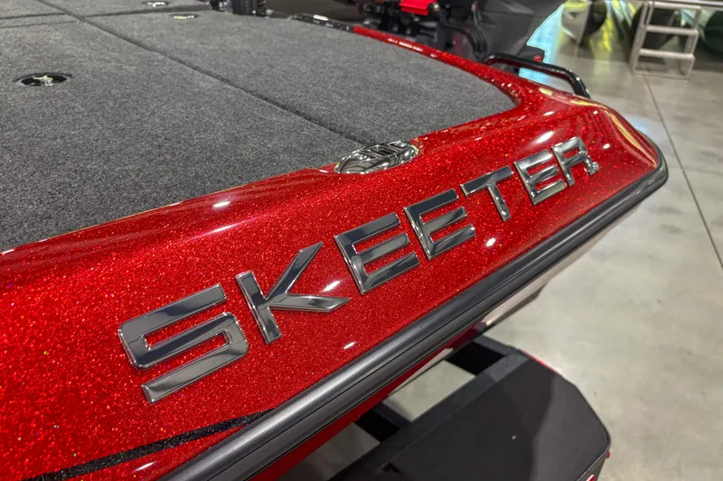 Slide: The Image of Red 2026 Skeeter ZXR19 boat with metallic finish and logo detail. - 8