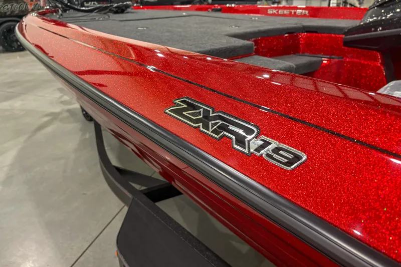 Slide: The Image of Red 2026 Skeeter ZXR19 boat with metallic finish and logo detail. - 9