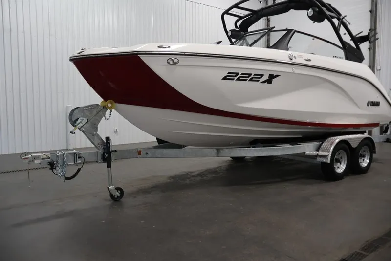 Slide: The Image of 2026 Yamaha Boats 222XE on trailer in indoor setting. - 36
