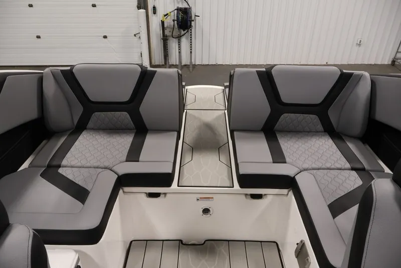 Slide: The Image of 2026 Yamaha Boats 222XE interior with modern gray and black seating design. - 32