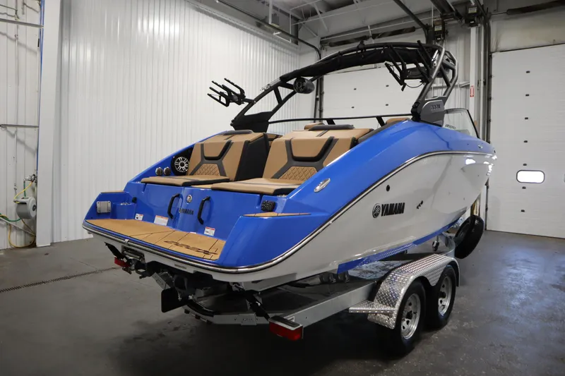 Slide: The Image of 2026 Yamaha Boats 222XE rear view, showcasing hull and hardware details. - 4