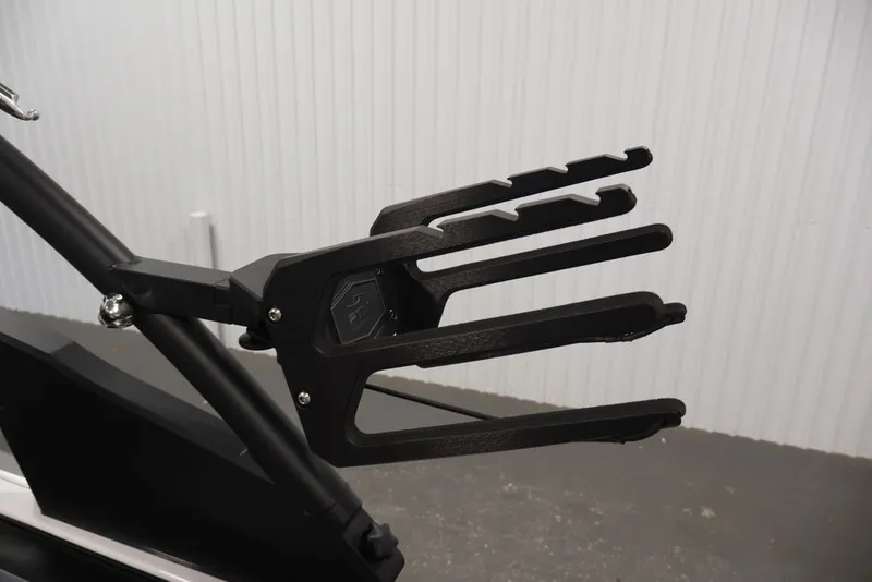 Slide: The Image of Wakeboard rack on 2026 Yamaha Boats 222XE, featuring sleek black design. - 33