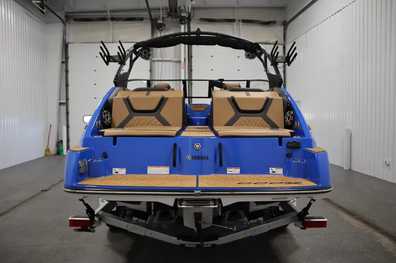 Slide: The Image of 2026 Yamaha Boats 222XE interior with sleek gray seating and modern design. - 5