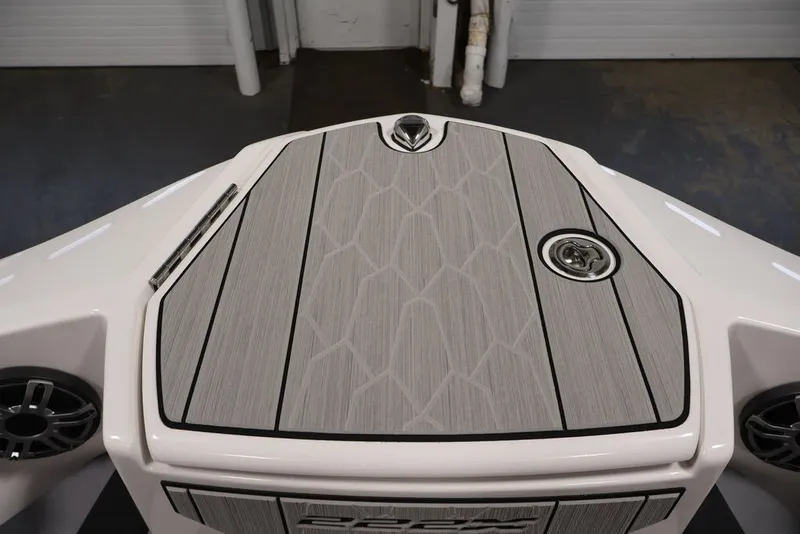 Slide: The Image of 2026 Yamaha Boats 222XE bow with sleek, modern design and textured deck. - 10
