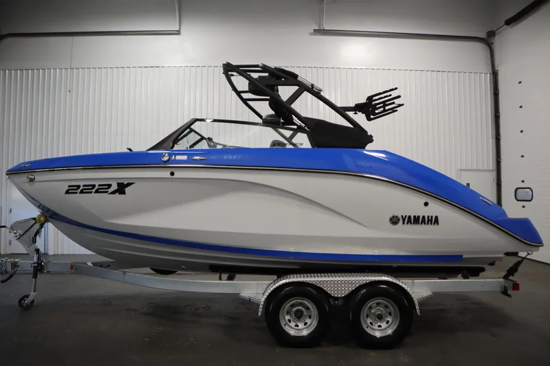 Slide: The Image of Control panel of 2026 Yamaha Boats 222XE with illuminated buttons and sleek design. - 7