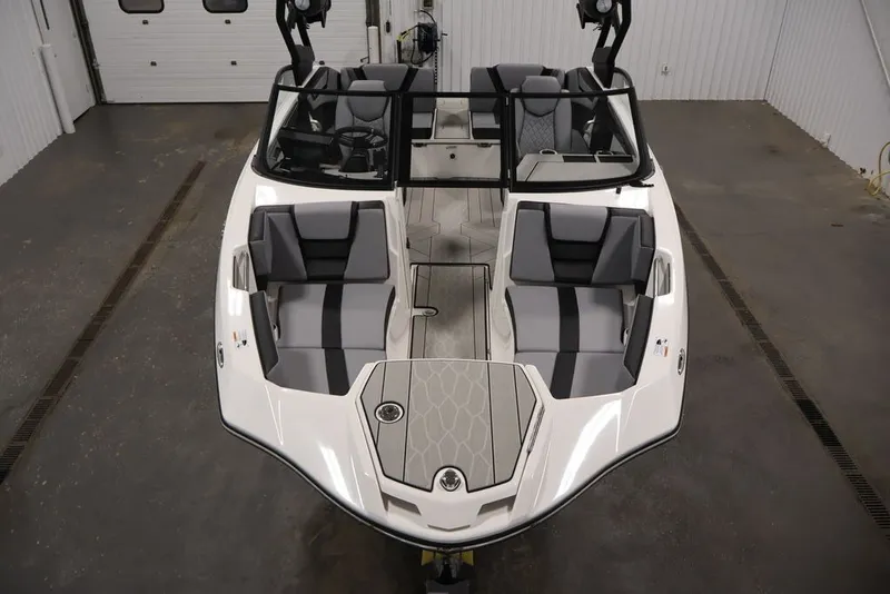 Slide: The Image of 2026 Yamaha Boats 222XE interior with sleek seating and modern design. - 9