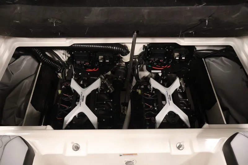 Slide: The Image of Engine compartment of 2026 Yamaha Boats 222XE, showcasing dual engines and components. - 30