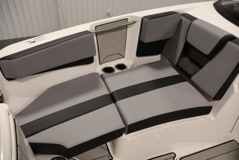 Slide: The Image of 2026 Yamaha Boats 222XE interior seating with gray and black cushioned design. - 19