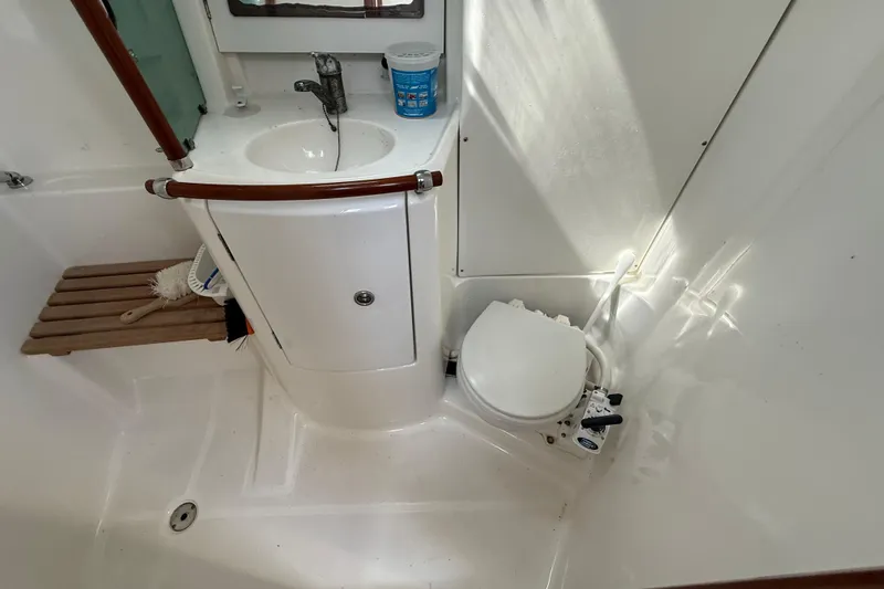 Slide: The Image of Bathroom of 2003 Beneteau Oceanis Clipper 361 yacht with sink and toilet. - 19