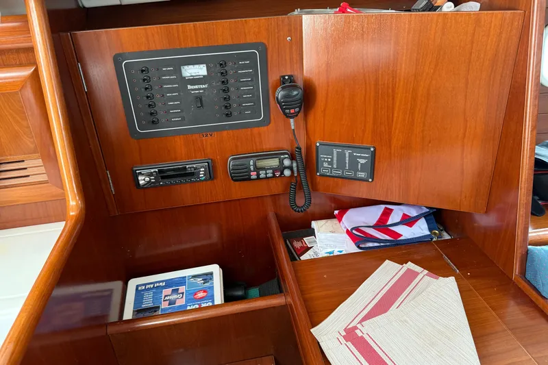 Slide: The Image of Interior of 2003 Beneteau Oceanis Clipper 361 with control panel and storage. - 26